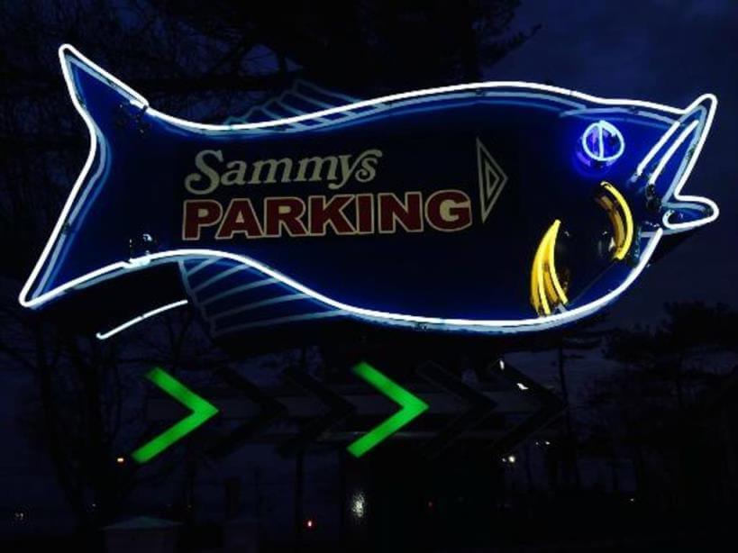 Sammy's parking neon sign at night