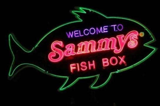 Sammy's neon sign at night